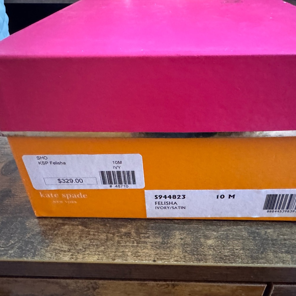 Kate Spade cream heels. Perfect for a wedding. See pictures for details.